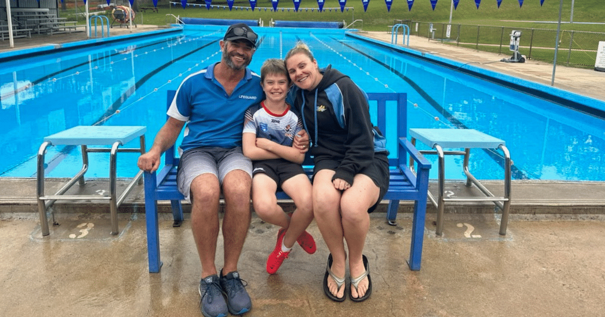 Zoe and Mark Philipzen, with son, Henry, at the Bega War Memorial Swimming Pool.