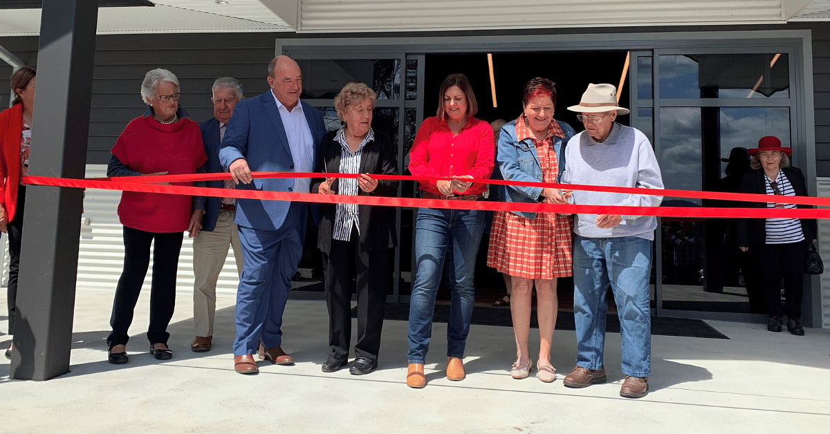 Government and community join to cut the ribbon and officially open the new Wandella Hall.