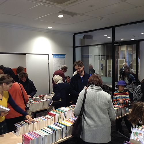 The public selecting books at the Tura Marrang Library opening.