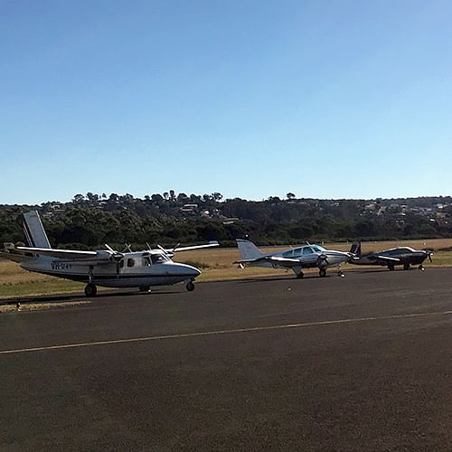 Light planes on the runway at Merimbula airport.