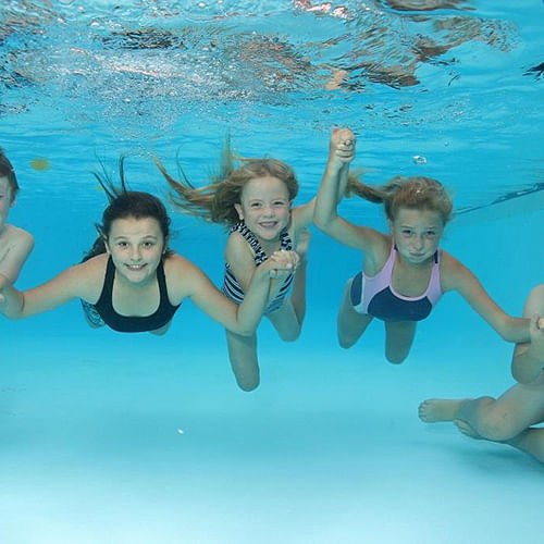 Children underwater at the Sapphire Aquatic Centre.