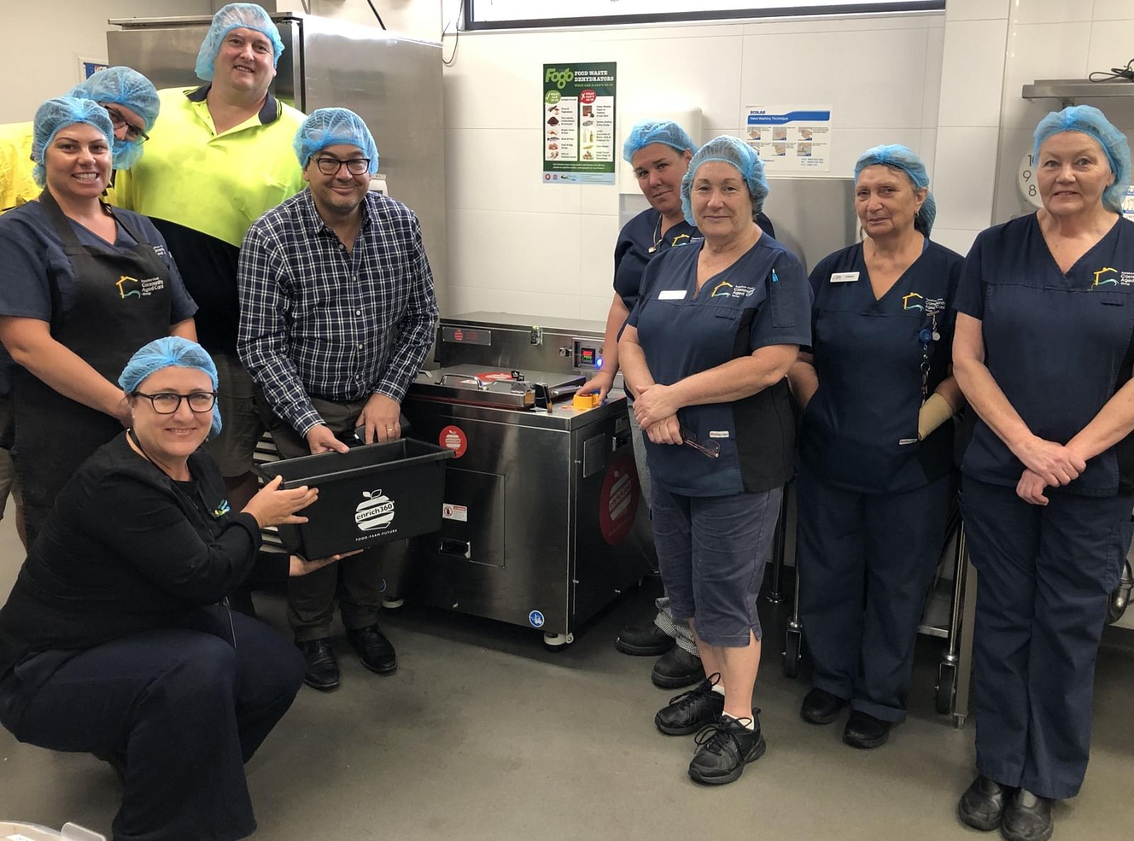 Staff at Hillgrove House being trained how to use the new food dehydrators by Enrich360 CEO Dean Turner, with BVSC Waste Project Officer Rechelle Fisher.