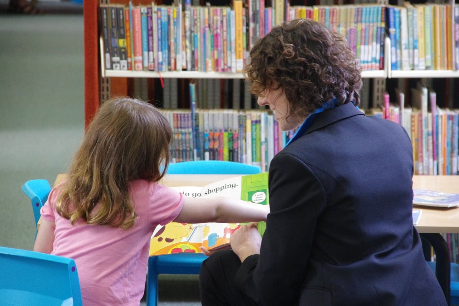 Librarian with child.