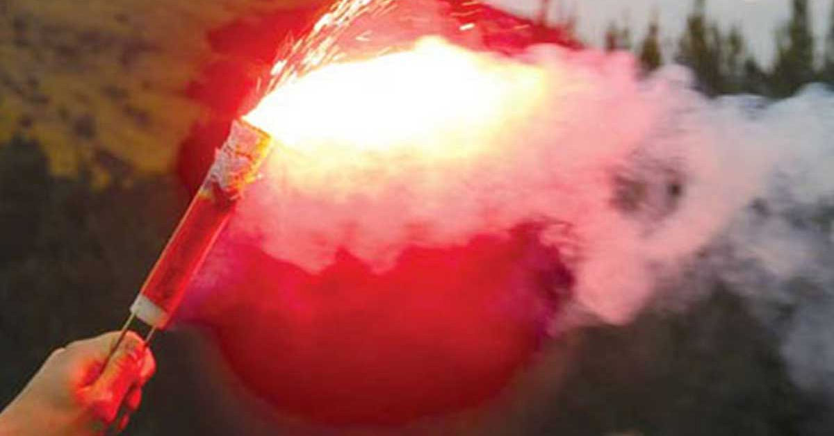 A distress marine flare being activated