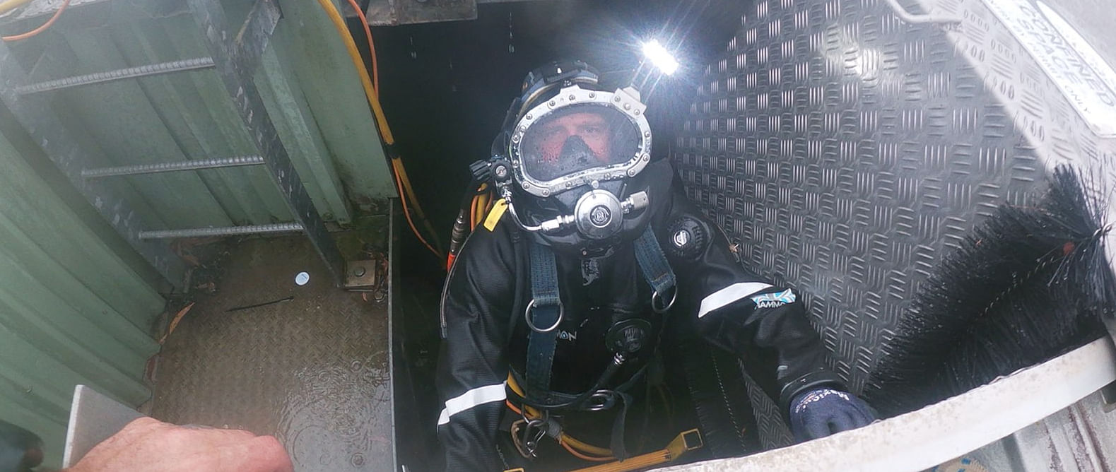 A diver at work, cleaning one of Bega Valley Shire's 51 drinking water reservoirs