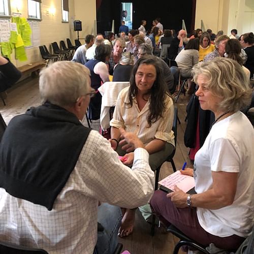 Councillor Cathy Griff chats with locals at Cobargo Hall.