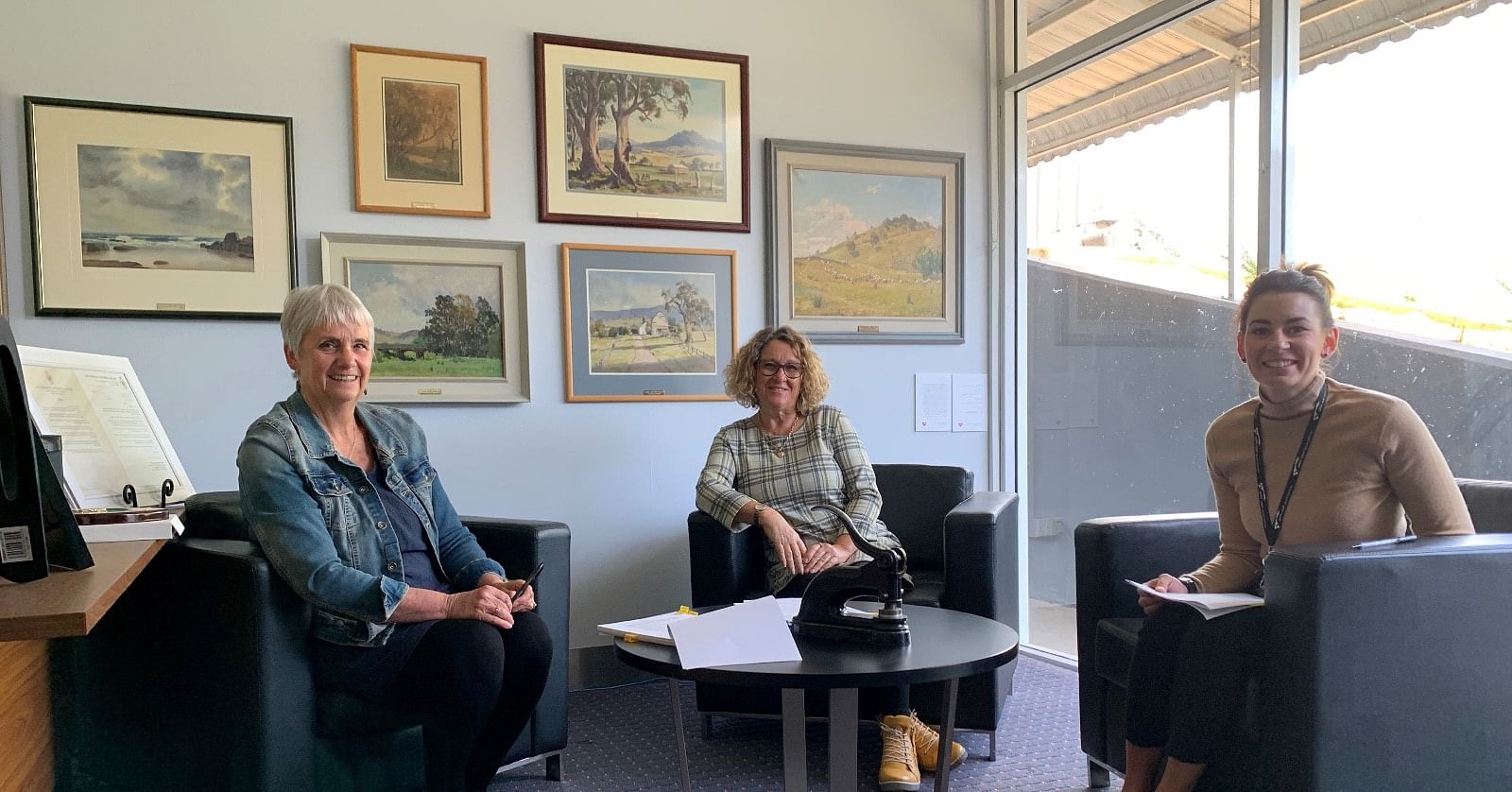 Photo: General Manager Leanne Barnes, Mayor Sharon Tapscott and Property & Facilities Coordinator Rickee Marshall oversee the settlement of the Australasia sale.