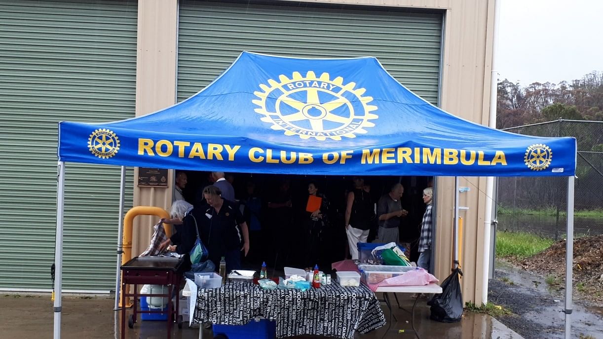 Rotary Club of Merimbula marquee in front of Kiah volunteer bush fire brigade shed.