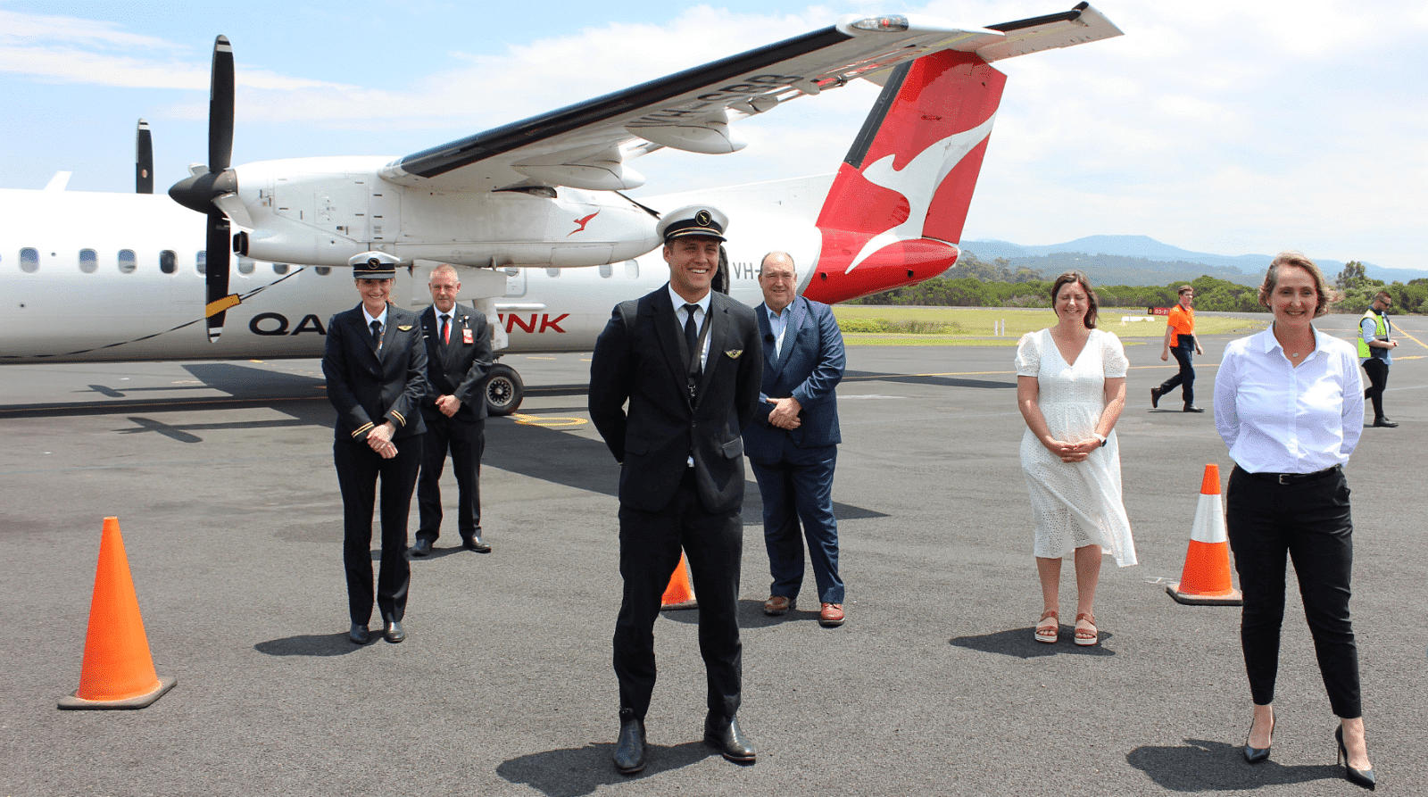 Qantas flight crew with Mayor Fitzpatrick, Member for Eden-Mondaro, Kristy McBain and Qantas Group CFO, Vanessa Hudson.