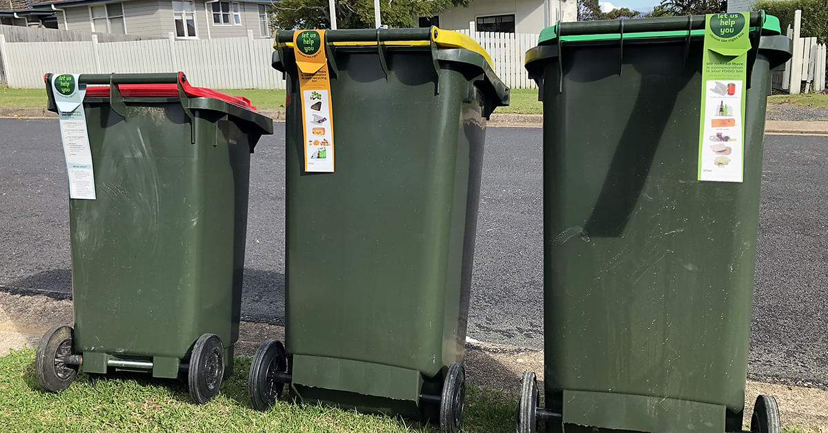 Red, yellow and green bin with bin tags.