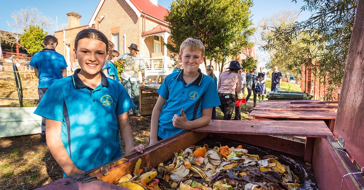 St Patrics School kids making compost.